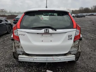 2016 Honda Fit LX with VIN JHMGK5H5XGX004515, listed as a Copart auction lot 84859914 with 154,136 mi miles and Salvage Title. Bid and sale history available at carsss.com. Image 6.