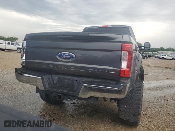 2018 Ford F-250 XL with VIN 1FT7W2B65JEB83300, listed as a Copart auction lot 55920255 with 104,125 mi miles and Salvage title. Bid and sale history available at DreamBid. Image 6.