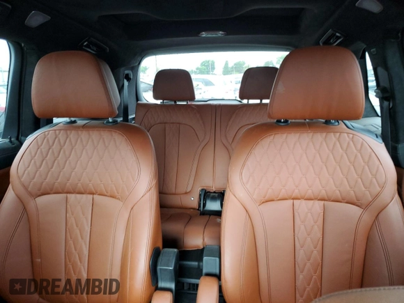 2020 BMW X7 M50i z VIN 5UXCX6C04L9B99921, wystawiony jako Copart lot #56665755 z przebiegiem 63 328 mil mil oraz Szkoda całkowita • Salvage title. Historia ofert i sprzedaży dostępna na DreamBid. Obrazek 10.