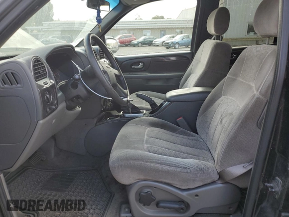 2003 GMC Envoy SLT with VIN 1GKES16SX36220489, listed as a Copart auction lot 71859834 with 148,811 mi miles and Salvage Title. Bid and sale history available at DreamBid. Image 7.