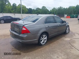 2012 Ford Fusion SE with VIN 3FAHP0HA7CR417511, listed as a IAAI auction lot 42436962 with 266,721 mi miles and . Bid and sale history available at DreamBid. Image 4.