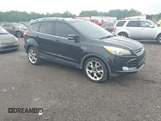 2015 Ford Escape Titanium z VIN 1FMCU0JX7FUB00462, wystawiony jako IAAI lot #42532943 z przebiegiem 88 623 mil mil oraz . Historia ofert i sprzedaży dostępna na DreamBid. Obrazek 1.