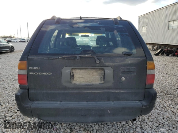 1999 Isuzu Rodeo S with VIN 4S2CK58W3X4362974, listed as a Copart auction lot 43155155 with 396,448 mi miles and Salvage Title. Bid and sale history available at DreamBid. Image 6.