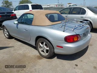 1999 Mazda MX-5 Miata with VIN JM1NB3539X0131393, listed as a IAAI auction lot 42439850 with 210,710 mi miles and . Bid and sale history available at DreamBid. Image 3.