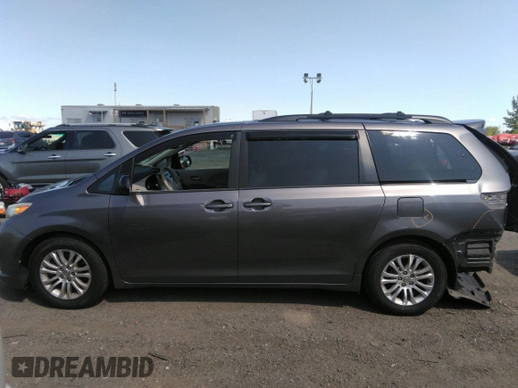 2014 Toyota Sienna XLE with VIN 5TDYK3DC2ES418860, listed as a IAAI auction lot 40139260 with 67,599 mi miles and . Bid and sale history available at DreamBid. Image 15.