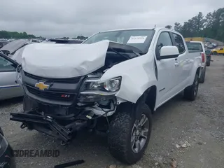 2020 Chevrolet Colorado 4WD Z71 with VIN 1GCGTDEN8L1238033, listed as a IAAI auction lot 42279524 with 22,164 mi miles and . Bid and sale history available at DreamBid. Image 2.