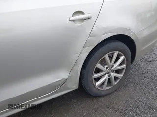 2013 Volkswagen Jetta SE z VIN 3VWDP7AJ9DM213171, wystawiony jako IAAI lot #42278515 z przebiegiem 146 386 mil mil oraz . Historia ofert i sprzedaży dostępna na DreamBid. Obrazek 6.