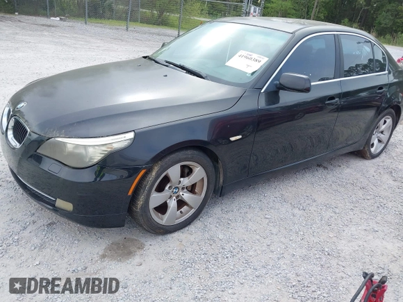 2008 BMW 5 Series 528i with VIN WBANU53578CT00673, listed as a IAAI auction lot 41960389 with 142,409 mi miles and . Bid and sale history available at carsss.com. Image 2.