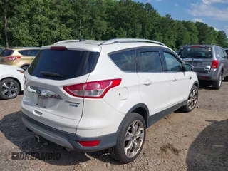 2015 Ford Escape Titanium with VIN 1FMCU9J90FUA05005, listed as a IAAI auction lot 42501764 with 121,993 mi miles and . Bid and sale history available at DreamBid. Image 4.