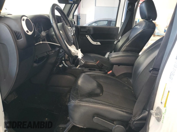 2015 Jeep Wrangler Unlimited Sahara with VIN 1C4BJWEG2FL620001, listed as a Copart auction lot 63914725 with 114,810 mi miles and Salvage title. Bid and sale history available at DreamBid. Image 7.