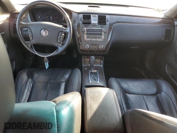 2009 Cadillac DTS 1SC z VIN 1G6KD57Y89U105190, wystawiony jako Copart lot #77560874 z przebiegiem 166 134 mil mil oraz Szkoda całkowita • Salvage title. Historia ofert i sprzedaży dostępna na DreamBid. Obrazek 8.