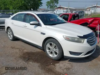 2014 Ford Taurus SEL with VIN 1FAHP2E84EG141795, listed as a IAAI auction lot 42133668 with 154,009 mi miles and . Bid and sale history available at DreamBid. Image 1.