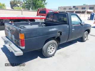 1995 Nissan Frontier with VIN 1N6SD11S8SC408960, listed as a IAAI auction lot 42215525 with 162,808 mi miles and . Bid and sale history available at DreamBid. Image 4.