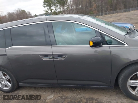 2012 Honda Odyssey Touring with VIN 5FNRL5H99CB071010, listed as a IAAI auction lot 41651233 with 186,913 mi miles. Bid and sale history available at carsss.com. Image 14.