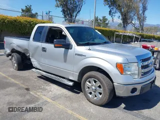 2014 Ford F-150 XL with VIN 1FTEX1CM2EFB01776, listed as a IAAI auction lot 41806274 with 157,704 mi miles. Bid and sale history available at carsss.com. Image 1.