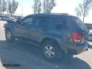 2007 Jeep Grand Cherokee Laredo with VIN 1J8HR48PX7C660601, listed as a IAAI auction lot 41652509 with 131,556 mi miles. Bid and sale history available at carsss.com. Image 15.