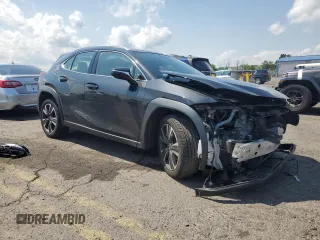 2020 Lexus UX 200 with VIN JTHX3JBHXL2025042, listed as a Copart auction lot 60426705 with 95,568 mi miles and Salvage title. Bid and sale history available at DreamBid. Image 4.