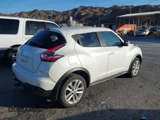 2016 Nissan Juke S with VIN JN8AF5MR7GT601556, listed as a IAAI auction lot 41210259 with 127,946 mi miles. Bid and sale history available at carsss.com. Image 4.
