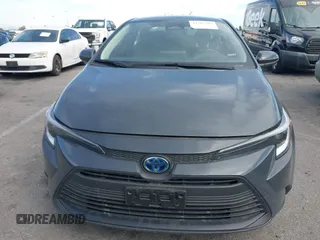2023 Toyota Corolla Hybrid LE with VIN JTDBCMFE8P3023738, listed as a IAAI auction lot 41765597 with 59,938 mi miles. Bid and sale history available at carsss.com. Image 12.