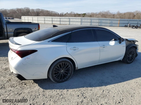 2019 Toyota Avalon Hybrid Limited with VIN 4T1B21FB9KU006159, listed as a Copart auction lot 43402355 with 129,787 mi miles and Salvage Title. Bid and sale history available at carsss.com. Image 3.