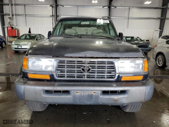 1997 Toyota Land Cruiser with VIN JT3HJ85J0V0184304, listed as a Copart auction lot 72438414 with 310,213 mi miles and Clean Title. Bid and sale history available at carsss.com. Image 5.