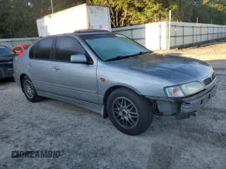 1999 Infiniti G20 z VIN JNKCP11A7XT020372, wystawiony jako Copart lot #73639514 z przebiegiem 174 467 mil mil oraz Szkody całkowita. Historia ofert i sprzedaży dostępna na DreamBid. Obrazek 4.