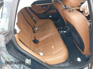 2016 BMW 4 Series 428i with VIN WBA4A9C52GGL88003, listed as a IAAI auction lot 42225642 with 105,054 mi miles and . Bid and sale history available at DreamBid. Image 8.