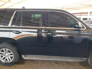 2015 Chevrolet Tahoe Commercial z VIN 1GNLC2EC0FR629983, wystawiony jako IAAI lot #41917584 z przebiegiem 111 461 mil mil oraz . Historia ofert i sprzedaży dostępna na DreamBid. Obrazek 13.