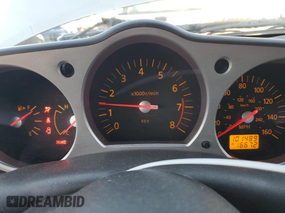 2005 Nissan 350Z Touring z VIN JN1AZ36A15M756659, wystawiony jako Copart lot #75458384 z przebiegiem 101 489 mil mil oraz Szkoda całkowita • Salvage title. Historia ofert i sprzedaży dostępna na DreamBid. Obrazek 9.