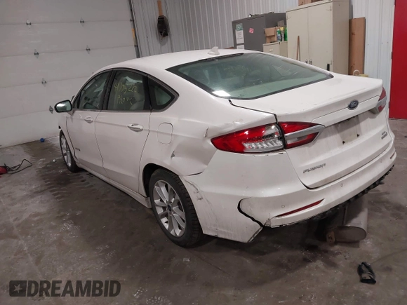 2019 Ford Fusion Hybrid SEL with VIN 3FA6P0MU8KR272811, listed as a IAAI auction lot 41705282 with 56,565 mi miles. Bid and sale history available at carsss.com. Image 3.