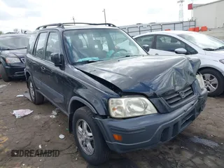 1999 Honda CR-V EX with VIN JHLRD1866XC055610, listed as a IAAI auction lot 41953453 with 152,557 mi miles. Bid and sale history available at carsss.com. Image 1.