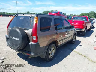2004 Honda CR-V LX with VIN JHLRD784X4C015401, listed as a IAAI auction lot 39704765 with 158,987 mi miles and . Bid and sale history available at carsss.com. Image 4.