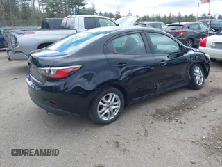 2016 Scion iA with VIN 3MYDLBZV6GY107350, listed as a IAAI auction lot 42032841 with 106,109 mi miles. Bid and sale history available at carsss.com. Image 4.