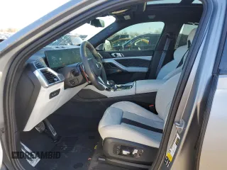 2024 BMW X6 M with VIN 5YM23ET0XR9U26576, listed as a Copart auction lot 86698164 with 6,669 mi miles and Salvage Title. Bid and sale history available at carsss.com. Image 7.