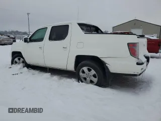2013 Honda Ridgeline RTL with VIN 5FPYK1F54DB012107, listed as a Copart auction lot 87448454 with 113,178 mi miles and Salvage title. Bid and sale history available at DreamBid. Image 2.