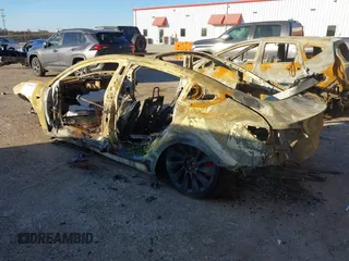2022 Tesla Model 3 Performance with VIN 5YJ3E1EC3NF320980, listed as a IAAI auction lot 41450357 with Not Provided miles and . Bid and sale history available at DreamBid. Image 3.