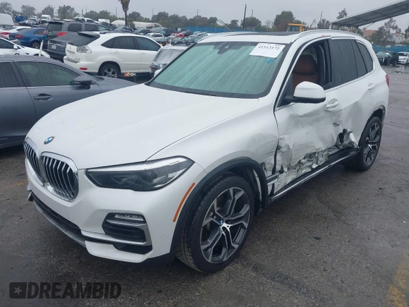 2021 BMW X5 sDrive40i with VIN 5UXCR4C03M9F24817, listed as a IAAI auction lot 41512172 with 54,867 mi miles. Bid and sale history available at carsss.com. Image 17.