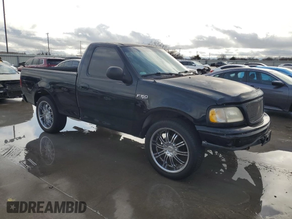 2000 Ford F-150 XL with VIN 1FTZF1725YNB93067, listed as a Copart auction lot 86750464 with Not provided miles and Salvage title. Bid and sale history available at DreamBid. Image 4.