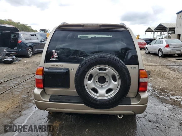 2002 Suzuki XL7 Standard z VIN JS3TY92V524101048, wystawiony jako Copart lot #77658264 z przebiegiem 226 279 mil mil oraz Szkoda całkowita • Salvage title. Historia ofert i sprzedaży dostępna na DreamBid. Obrazek 6.