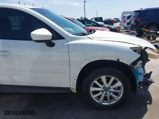 2014 Mazda CX-5 Touring with VIN JM3KE2CY2E0426164, listed as a IAAI auction lot 41812932 with 186,015 mi miles. Bid and sale history available at carsss.com. Image 19.