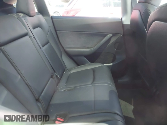 2024 Tesla Model Y Long Range with VIN 7SAYGAEE4RF078906, listed as a IAAI auction lot 42051207 with Not Provided miles and . Bid and sale history available at DreamBid. Image 8.