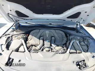 2019 BMW 7 Series 750i with VIN WBA7F0C5XKGM25771, listed as a IAAI auction lot 42167614 with 73,692 mi miles. Bid and sale history available at carsss.com. Image 10.