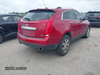 2015 Cadillac SRX Luxury Collection with VIN 3GYFNBE36FS560305, listed as a IAAI auction lot 42142934 with 160,543 mi miles and . Bid and sale history available at carsss.com. Image 4.