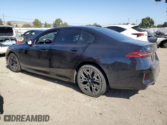 2024 BMW i5 eDrive40 with VIN WBY33FK03RCS14771, listed as a Copart auction lot 62393255 with 25,192 mi miles and Salvage title. Bid and sale history available at DreamBid. Image 2.