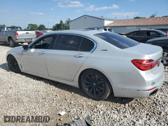 2017 BMW 7 Series 740e xDrive iPerformance with VIN WBA7J2C3XHG497958, listed as a Copart auction lot 58203604 with 75,256 mi miles and Salvage Title. Bid and sale history available at carsss.com. Image 2.