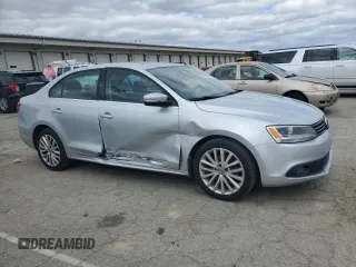 2012 Volkswagen Jetta SEL with VIN 3VWLX7AJXCM361484, listed as a Copart auction lot 53260985 with 155,585 mi miles and Salvage title. Bid and sale history available at DreamBid. Image 4.