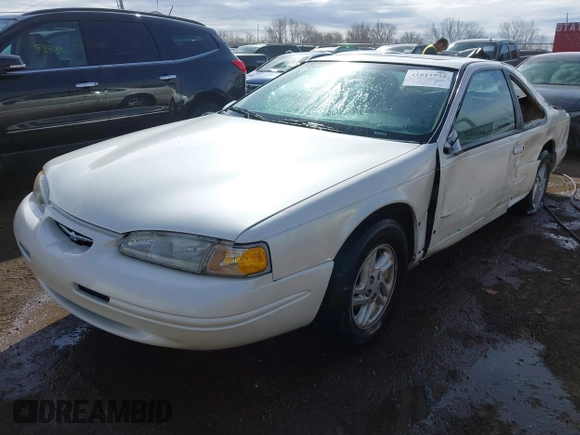 1996 Ford Thunderbird LX z VIN 1FALP6240TH131517, wystawiony jako IAAI lot #41811552 z przebiegiem 87 493 mil mil oraz . Historia ofert i sprzedaży dostępna na DreamBid. Obrazek 2.