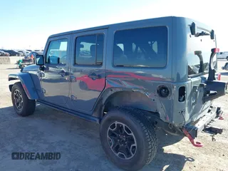 2015 Jeep Wrangler Unlimited Rubicon with VIN 1C4BJWFG7FL525724, listed as a IAAI auction lot 41394059 with 132,058 mi miles. Bid and sale history available at carsss.com. Image 3.