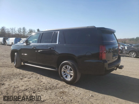 2015 Chevrolet Suburban LT with VIN 1GNSKJKC0FR201554, listed as a Copart auction lot 45614633 with 81,400 mi miles and . Bid and sale history available at DreamBid. Image 2.