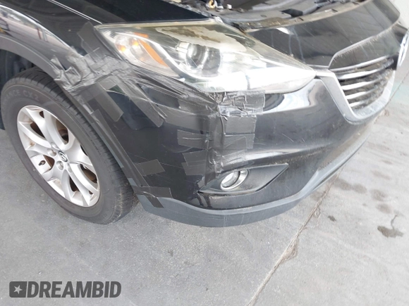 2014 Mazda CX-9 Touring with VIN JM3TB2CA2E0446267, listed as a IAAI auction lot 42196512 with 98,670 mi miles and . Bid and sale history available at carsss.com. Image 6.